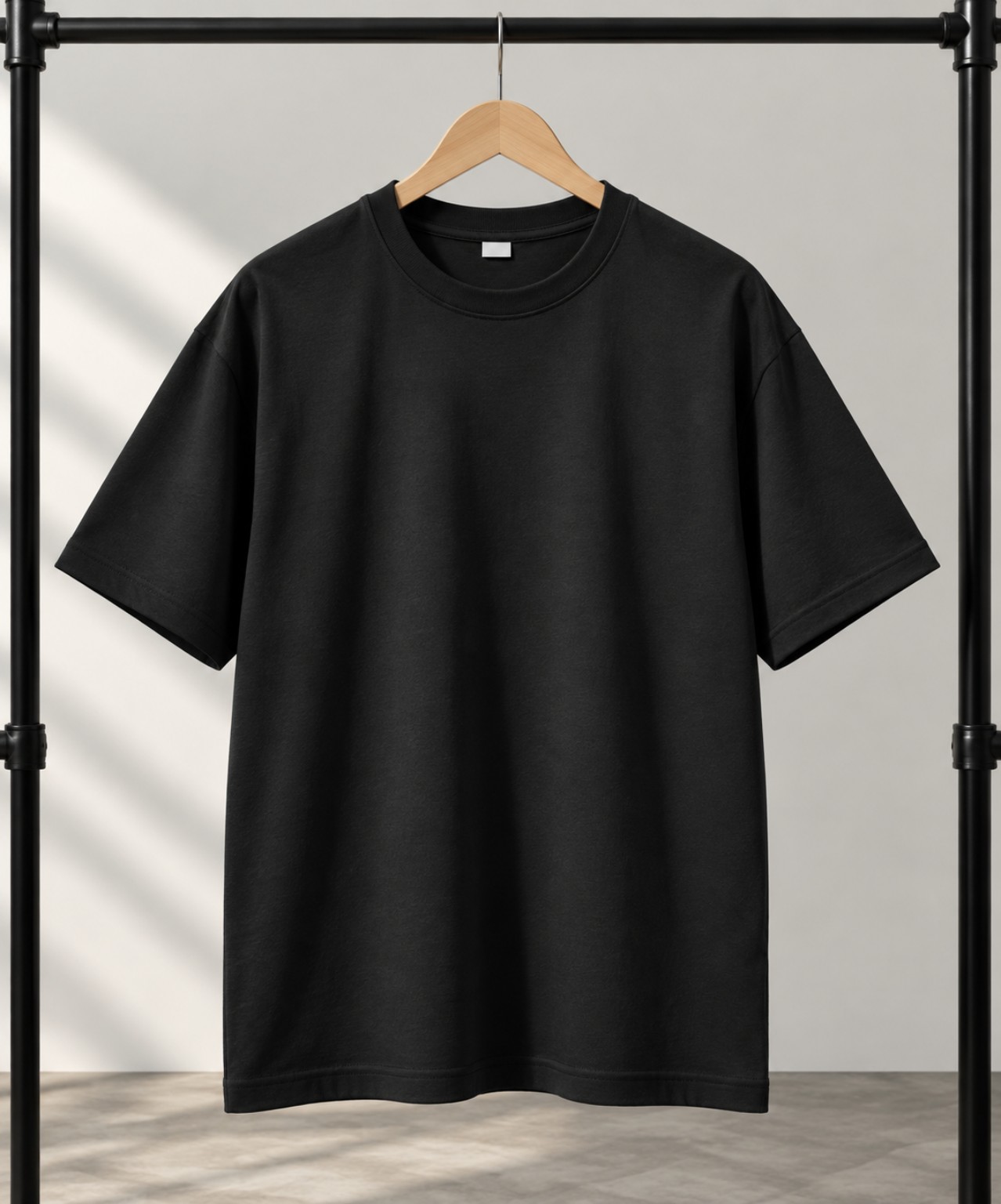 Maroon oversized t-shirt on a hanger